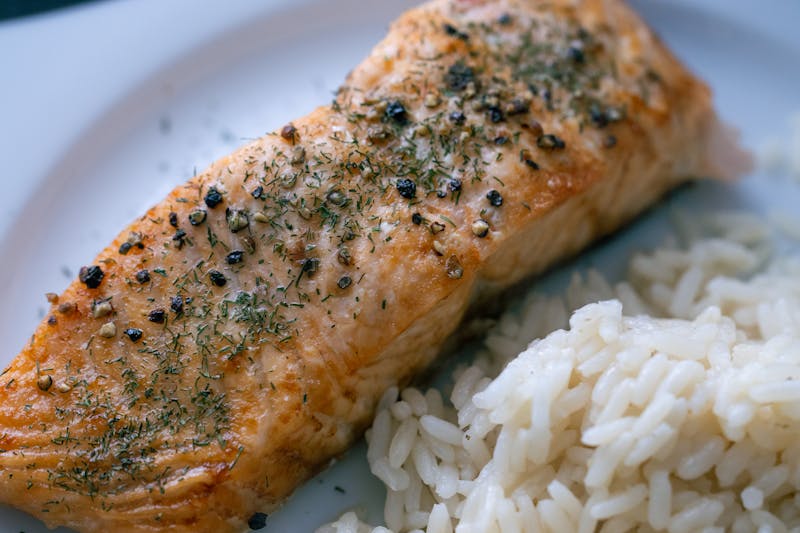 Restaurant kitchen with chefs preparing food